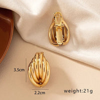Goldbeschichtete Muschel